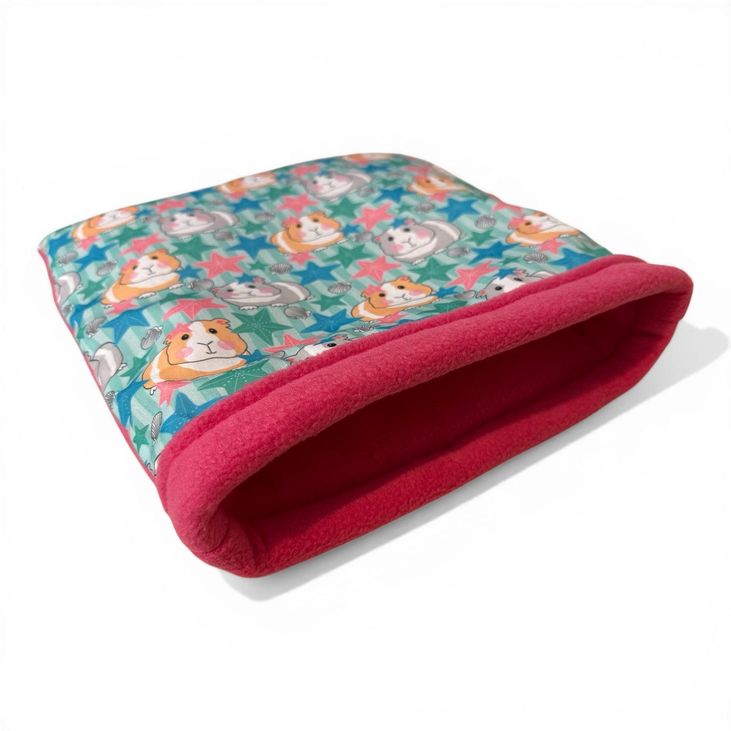 Flisinis guolis–miegmaišis jūrų kiaulytei – rožinis su jūrų kiaulytėm